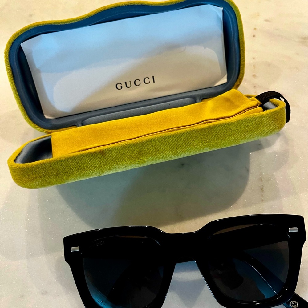 Authentic Gucci black sunglasses with case.
